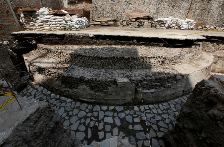 Image: A new Aztec discovery of the remains of the main temple of the wind god Ehecatl, a major deity, is seen during a tour of the area, located just off the Zocalo plaza in the heart of downtown Mexico City