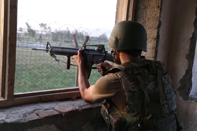 Image: An Afghan Army soldier mans a check point in Jalalabad, the provincial capital of Nangarhar province, Afghanistan