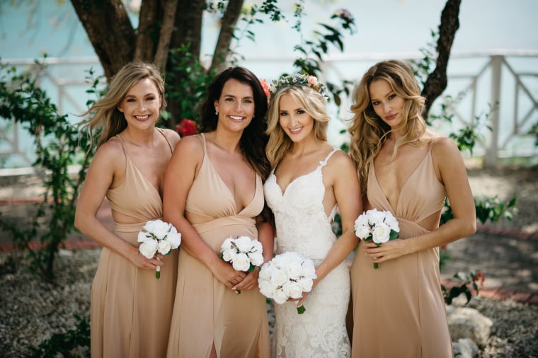 Jess Nakrayko with her bridesmaids. Kieley and Lee, Nakrayko's sister, stand on either side of the bride. 