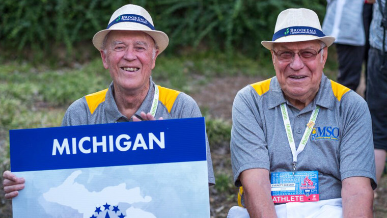 Bill Brownson and Everett "Ev" Beemer represented Michigan in National Senior Games. The two men became best friends as they bonded over being caregivers to their wives.