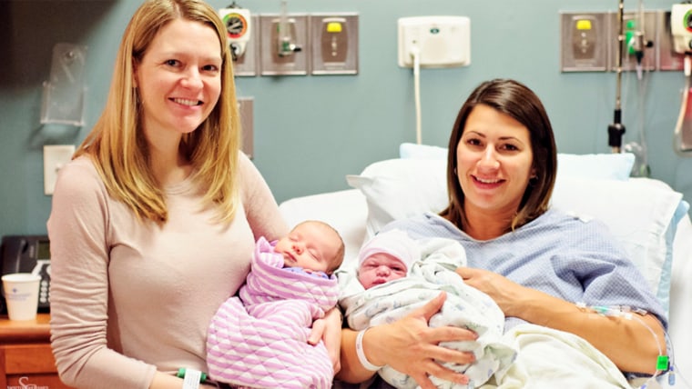 Ashley Brown, right, carried baby Audrey for Nancy. 