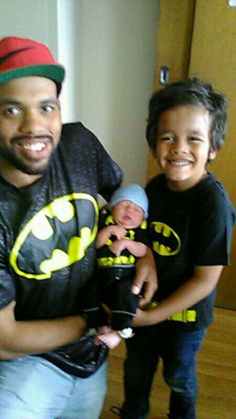 Williams with his Jaden and Joziah, 2 weeks old. 