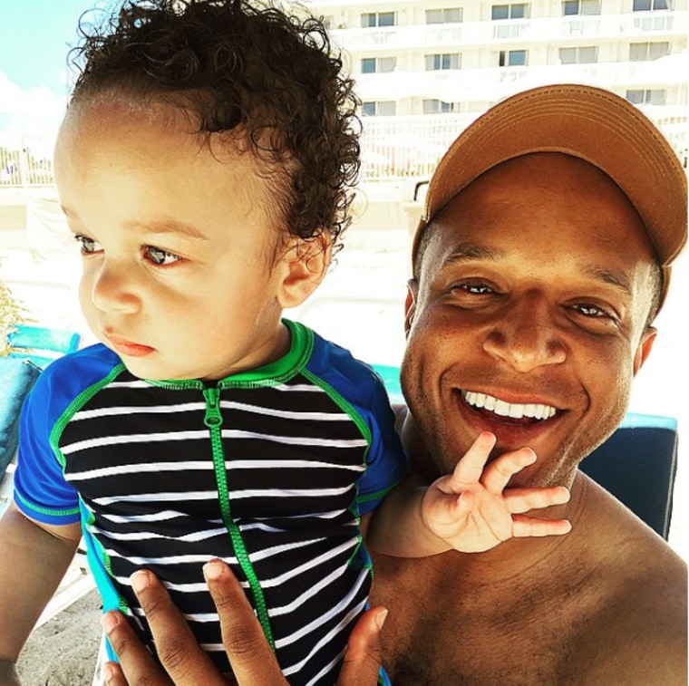 Craig Melvin with his son Del.