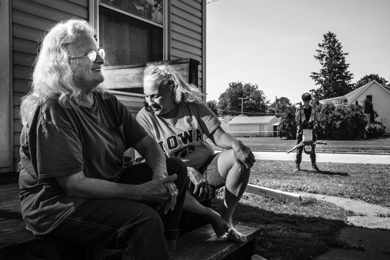 Image: Elizabeth Bemer (left) and her daughter Diana Bemer (right), sit on their steps as they talk about Trump.