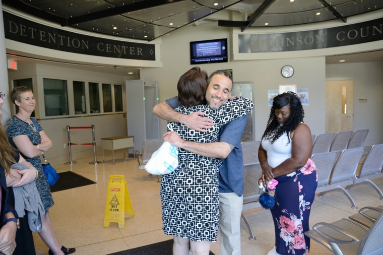 Image: Richard Jones reconnects with family after being released from prison.