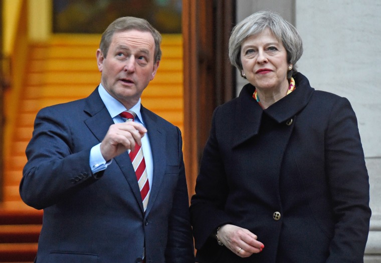 Ireland's Taoiseach Enda Kenny greets Britain's Prime Minister Theresa May to Government Buildings in Dublin