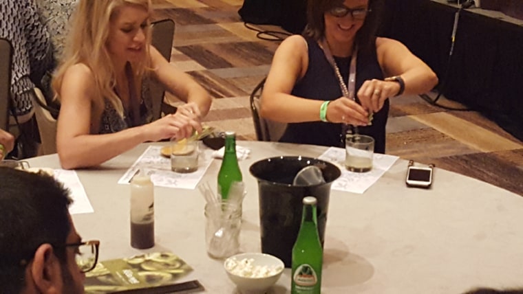 Participants during Tiffanie Barrierre's AFWF presentation making their own mixed drinks.