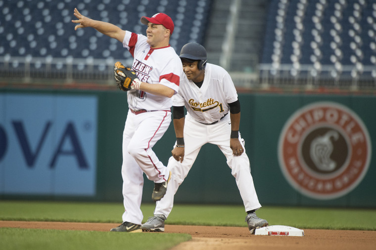 Image: Reps. Cedric Richmond, D-La., right, and Steve Scalise, R-La., play in the 55th Congressional Baseball Game