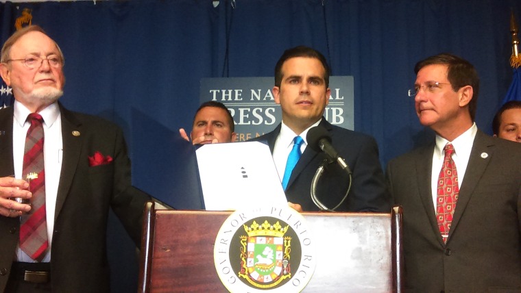 Puerto Rico Governor Ricardo Rossell?, accompanied by island officials and Reps. Don Young (R-AK) and Darren Soto (D-FL) at a press conference June 15, 2017 in Washington, D.C.  to officially present the results of the June 11 island plebiscite.