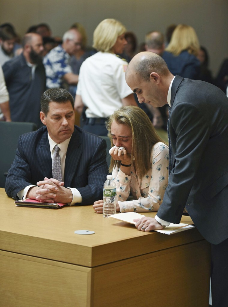 Image: Michelle Carter cries while flanked by defense attorneys Joseph Cataldo, left, and Cory Madera