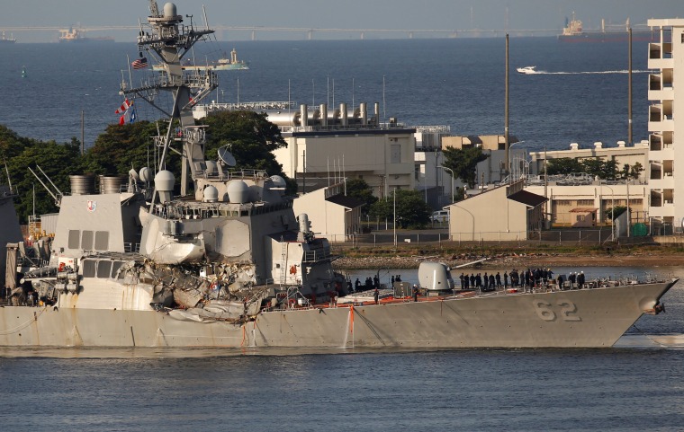 Image: The Arleigh Burke-class guided-missile destroyer USS Fitzgerald, damaged by colliding with a Philippine-flagged merchant vessel, arrives at the U.S. naval base in Yokosuka