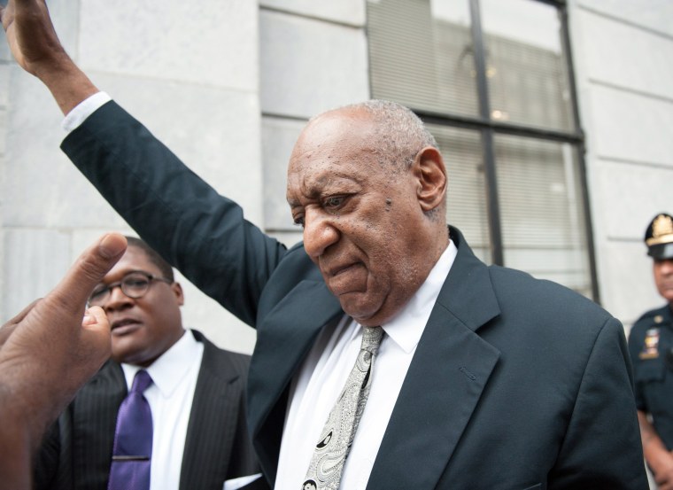 Image: Entertainer Bill Cosby raises his fist as he leaves the Montgomery County Courthouse in Norristown, Pennsylvania, June 17, 2017, after a mistrial was announced in the trial against him.
