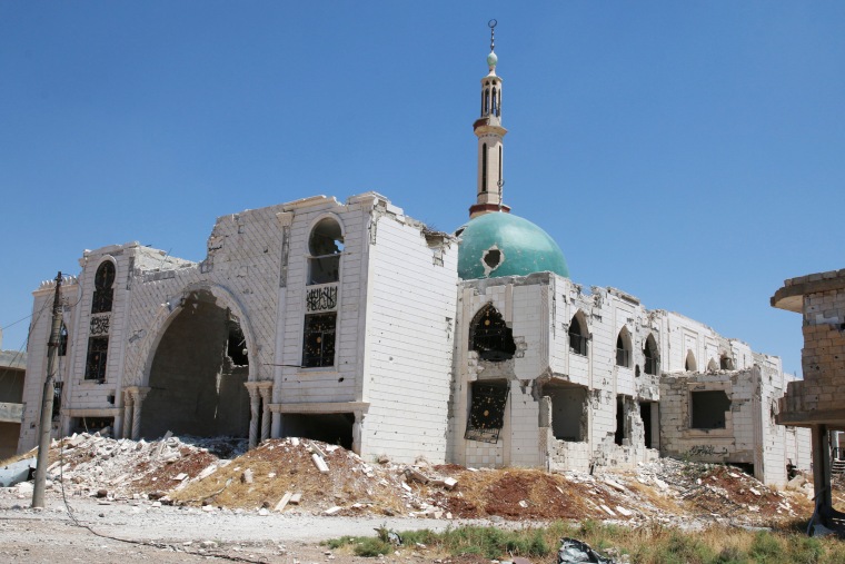 Image: The damaged Al-Rahman mosque is pictured at al-Nuaimah village in Deraa province