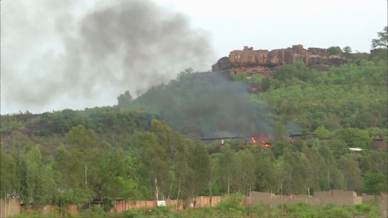 Image: Flames rise following an attack where gunmen stormed Le Campement Kangaba resort in Dougourakoro, to the east of the capital Bamako, Mali in this still frame taken from video