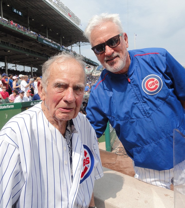 Russ Gremel at Chicago Cubs game with manager Joe Maddon.