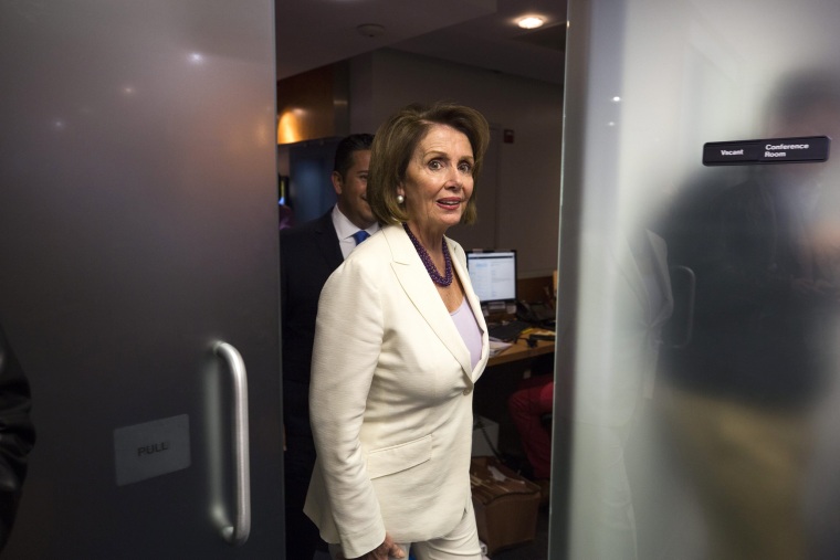 Image: Nancy Pelosi wears an all-white pantsuit