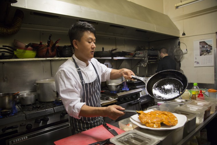 Image: King, a 34-year-old Korean barbecue owner in New Malden