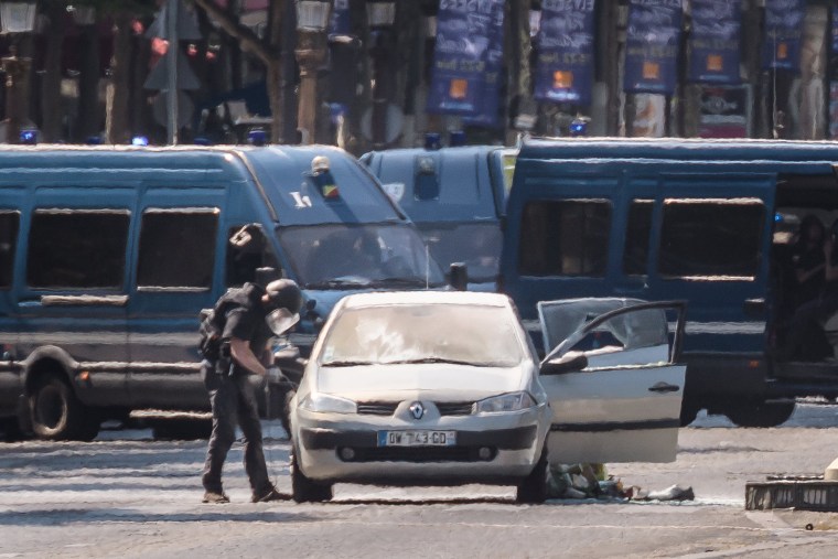 Image: Police operation underway on Champs Elysees Avenue