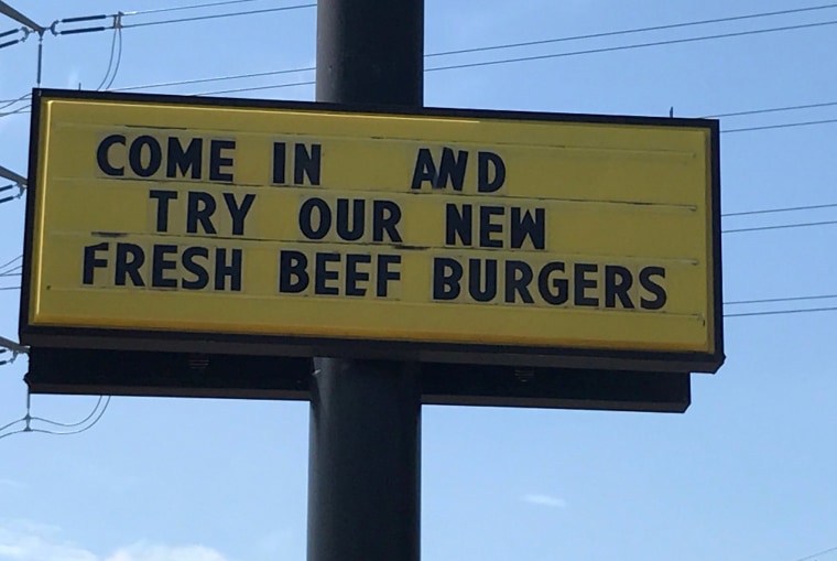 Image: A sign advertising hamburgers made with fresh beef is seen at a McDonald's restaurant in Dallas