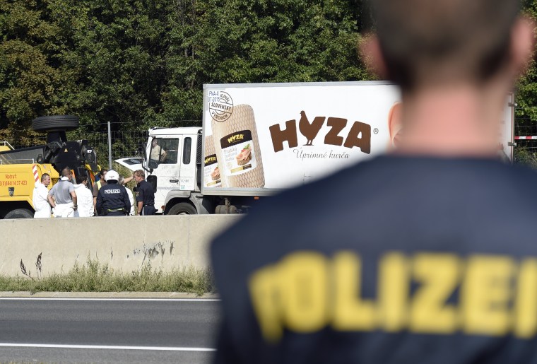 Image: The truck in which the refugees suffocated was found on a freeway in Austria in August, 2015.
