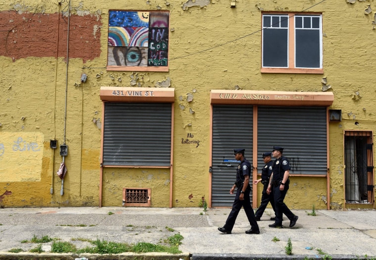 Image: Camden County Police Department officers are seen on foot patrol in Camden