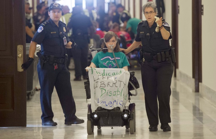 Image: U.S. Capitol Police arrest a protester