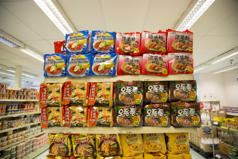 Image: An array of colorful packaging at the Korea Foods superstore in New Malden, London
