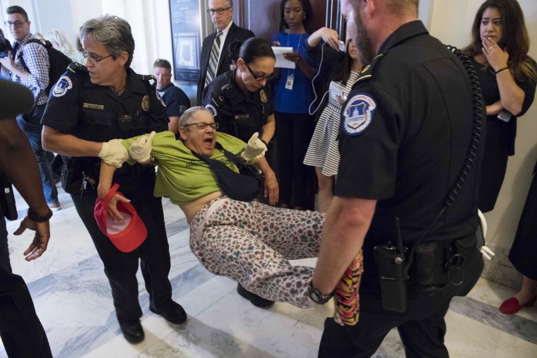 Image: US Capitol Police arrest a woman