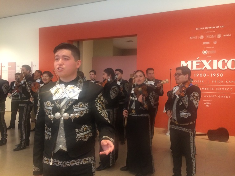 Attendees of the NALEO conference were welcomed to an exhibit of Mexican art by a mariachi band.