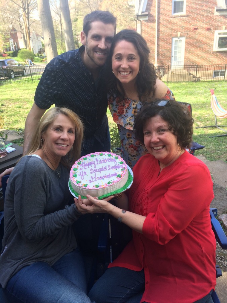 And baby will make three. Derek and Hillary Hinrichs, with their mothers, right after they shared the news.