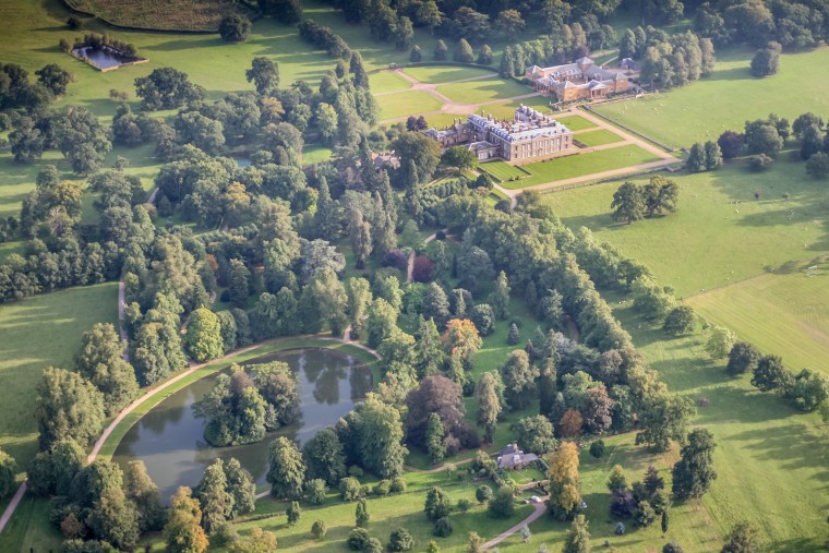 Princess Diana was interred on the grounds of her family's estate, Althorp House. The island in the Round Oval lake is her burial site.