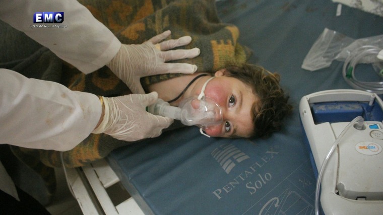 Image: A child receives treatment at a field hospital after an alleged chemical attack in Idlib, northen Syria