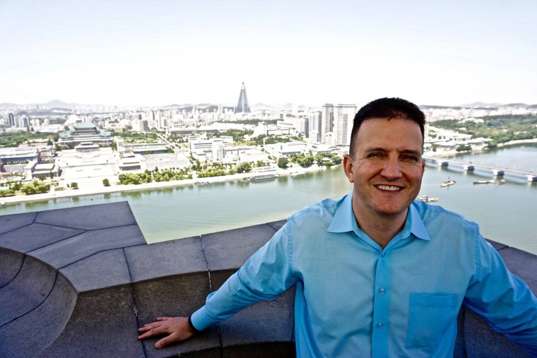 Image: Randy Williams poses at the top of the Juche Tower in Pyongyang