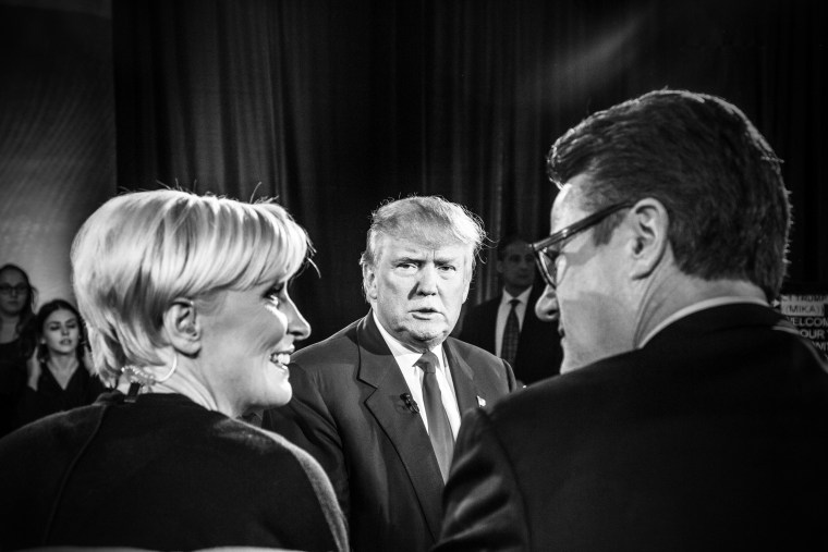 Image: Trump looks toward Mika Brzezinski and Joe Scarborough