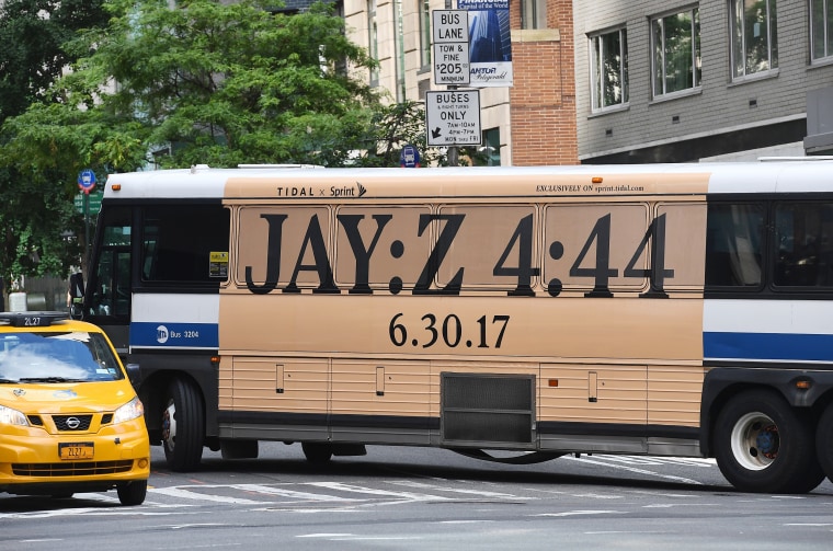Image: A New York City bus with an advertisement for Jay-Z's anticipated new album "4:44"
