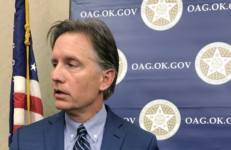 Image: Oklahoma Attorney General Mike Hunter speaks at a news conference about a lawsuit where the state accused drugmakers of misrepresenting the risks of opioid pain medications in Oklahoma City