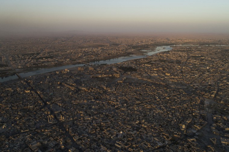 Image: The Tigris river separates the east, top, and west side of Mosul, seen here during fighting on June 29.
