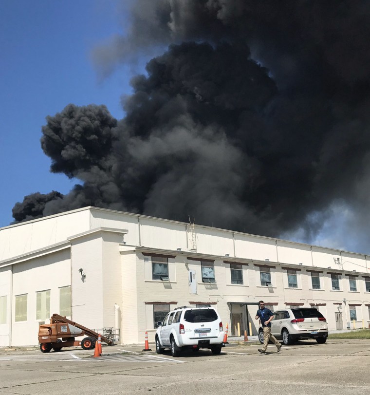 Image: Heavy smoke billows from a building at Eglin Air Force Base