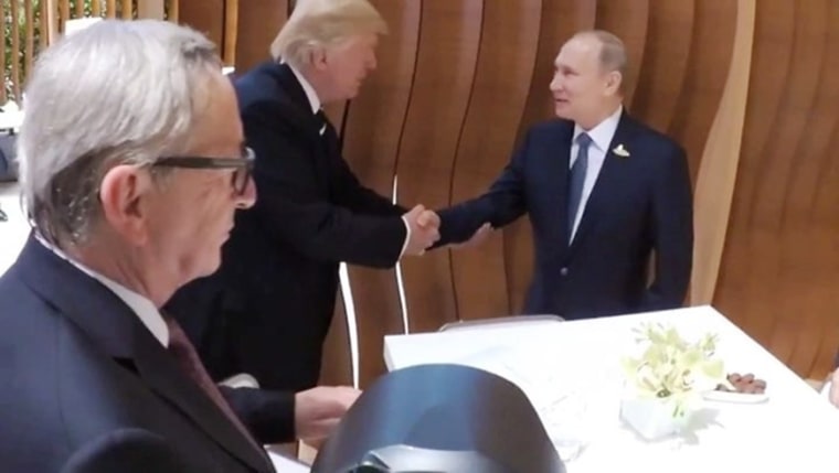 Image: President Donald Trump and Russian President Vladimir Putin shake hands at the G-20 Summit