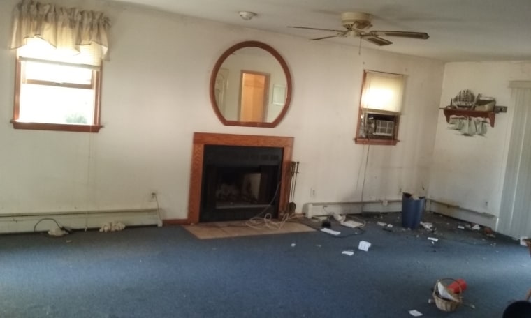 Before: The original living room in Meredith Borrell and Brian Ketcik's fixer-upper.