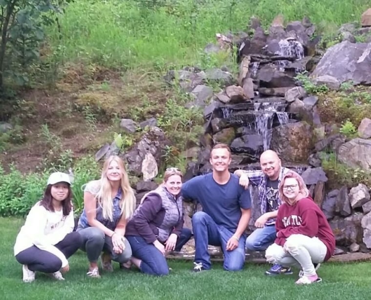 Jacob Kilby poses with his new extended family, Becky and Kelly Turney, and their daughters, Maddy, Chase and Paige.