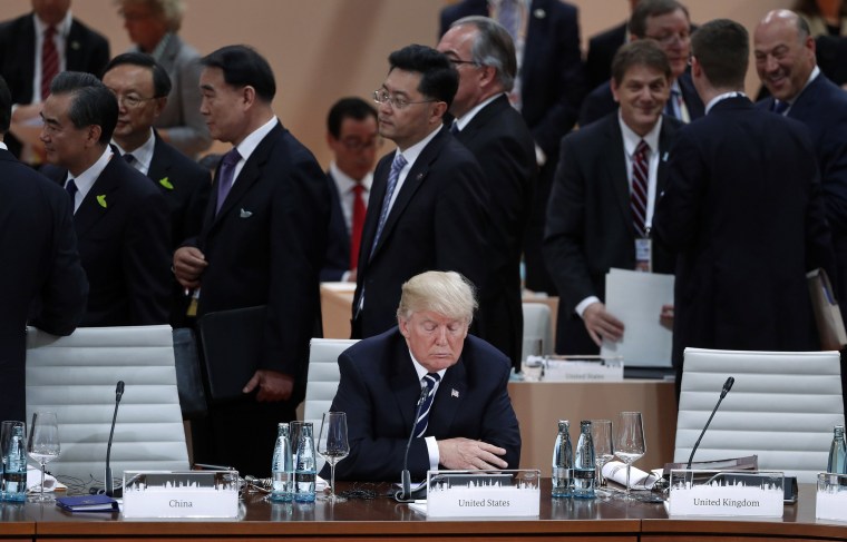 Image: Trump sits alone at the beginning of the plenary session