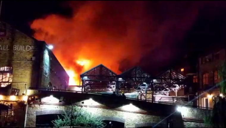 Image: Camden Market is seen ablaze in London