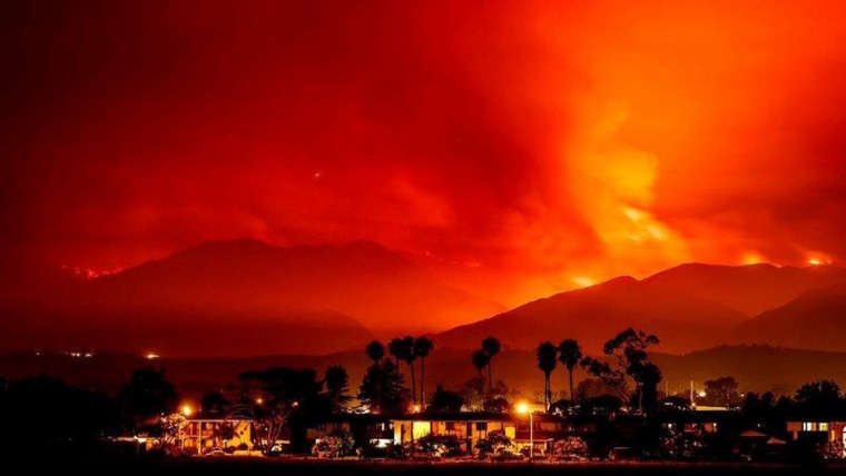Image: Smoke is illuminated by the Whittier wildfire near Santa Ynez