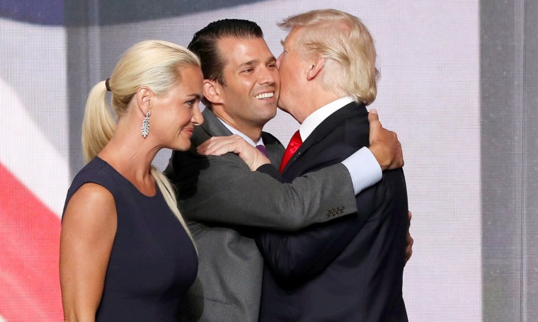 Image: Donald Trump Jr. hugs his father at end of 2016 Republican National Convention in Cleveland