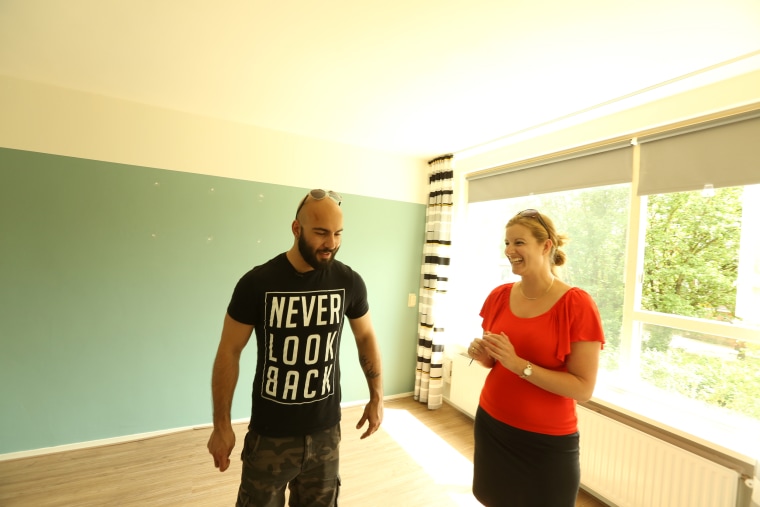 Image: Adel Saflou inspects his new apartment, his first home as an adult