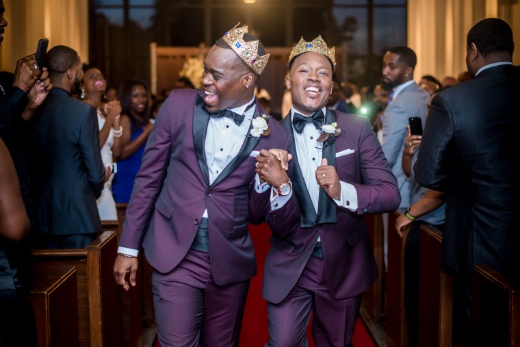 Adrian Homer, left, and Harrison Guy during their wedding ceremony at the University of Houston's A.D. Bruce Religion Center on April 15, 2017.