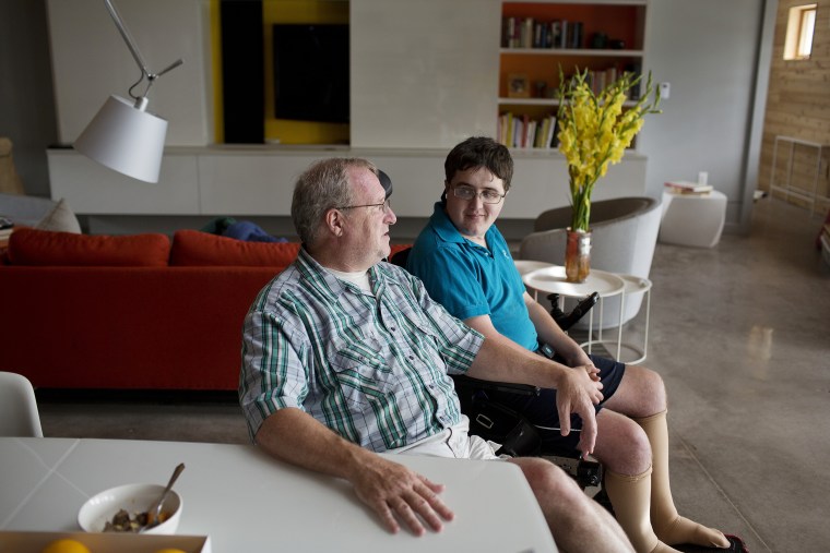 Image: Ed Slattery talks with his son Matthew, 16, at their home in Timonium, Maryland