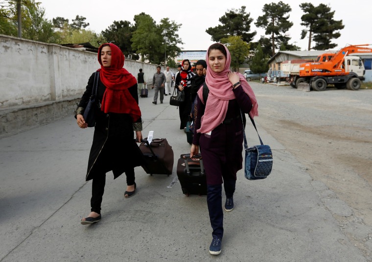 Image: Members of Afghan robotics girls team arrive to receive their visas from the U.S. embassy in Kabul