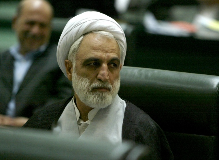 Image: First Deputy of the Chief Justice of Iran Gholamhossein Mohseni-Ejei listens to a member of parliament's speech at the Iranian parliament, Aug. 21, 2005.